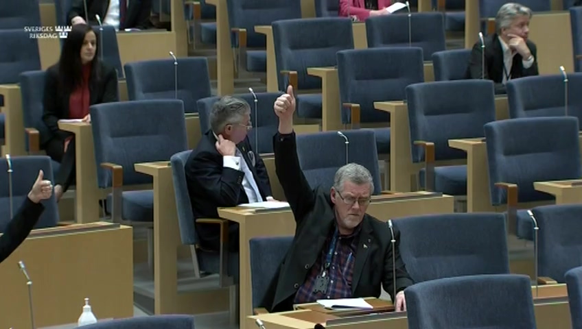 Stillbild från debatten i kammaren