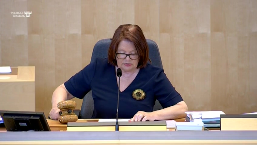 Stillbild från debatten i kammaren