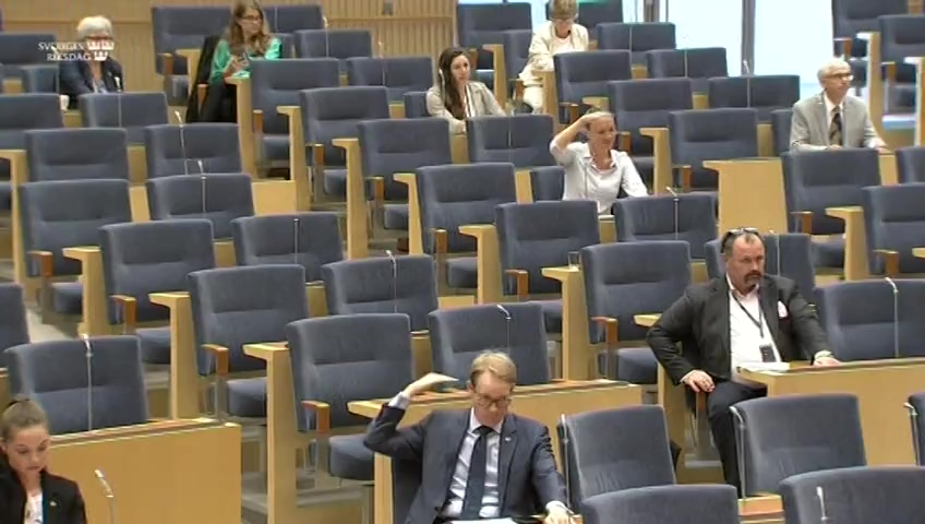 Stillbild från debatten i kammaren