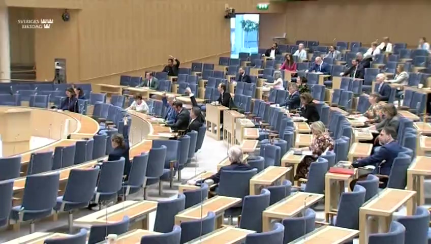 Stillbild från debatten i kammaren