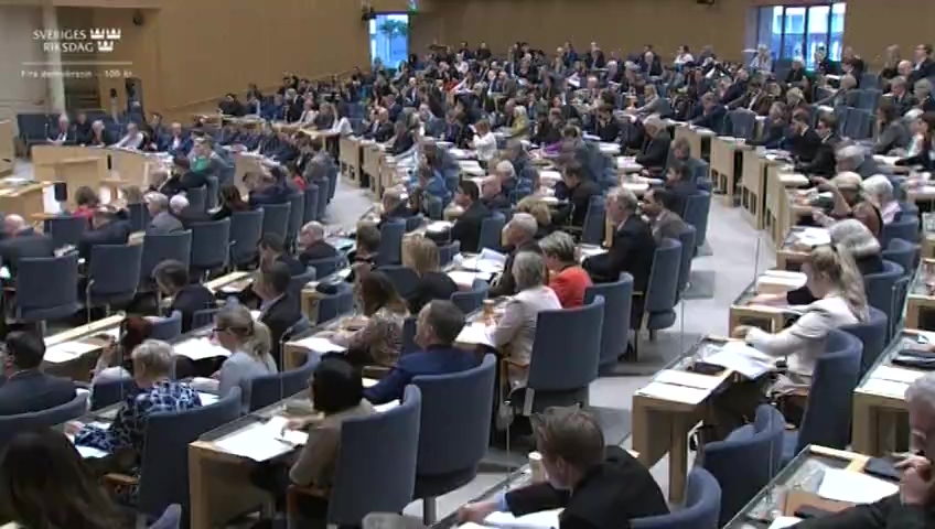 Stillbild från debatten i kammaren