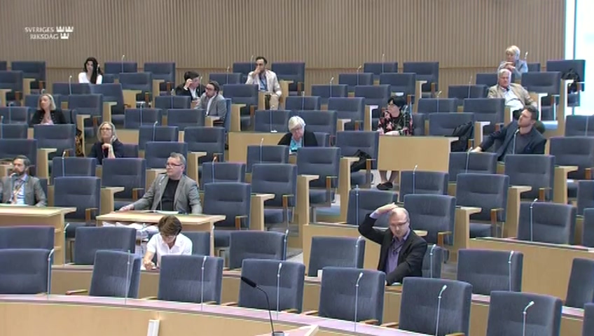 Stillbild från debatten i kammaren