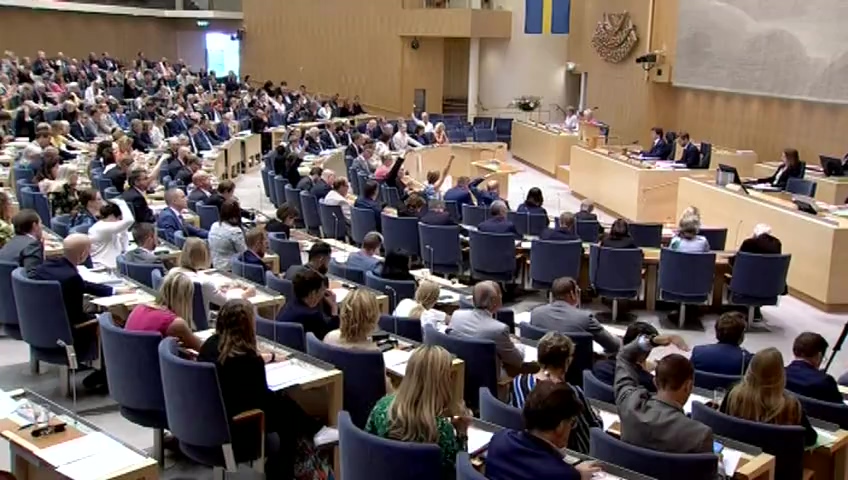 Stillbild från debatten i kammaren