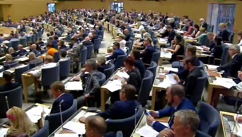 Stillbild från debatten i kammaren