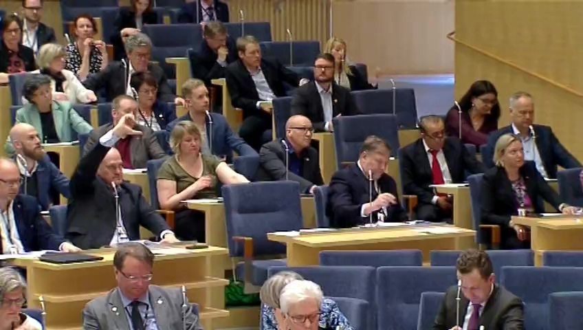 Stillbild från debatten i kammaren