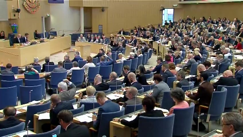 Stillbild från debatten i kammaren