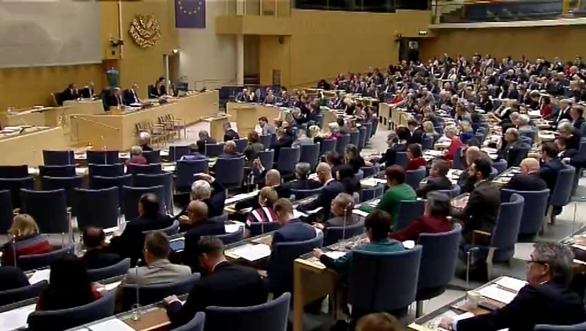 Stillbild från debatten i kammaren