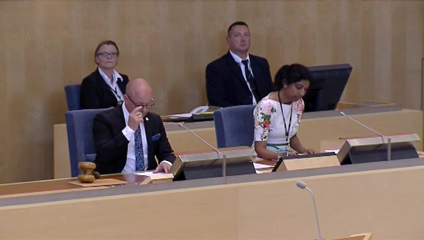 Stillbild från debatten i kammaren
