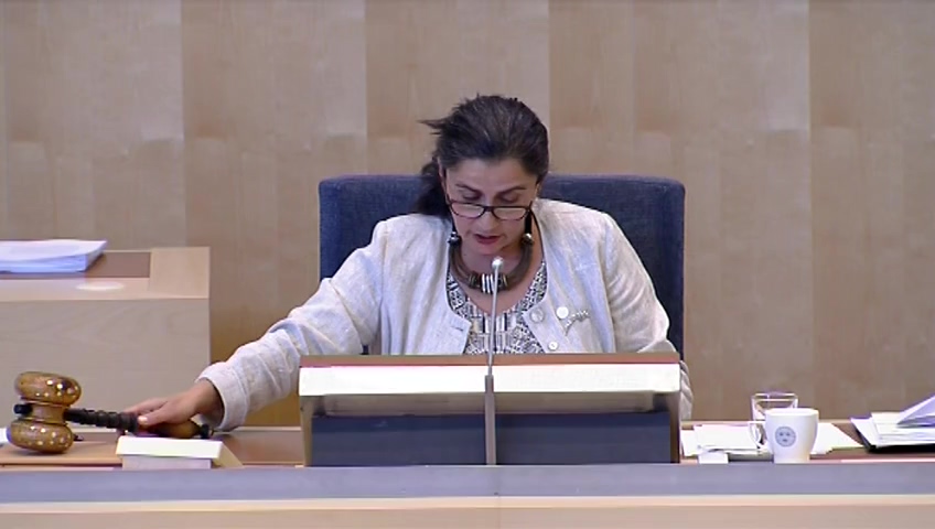 Stillbild från debatten i kammaren