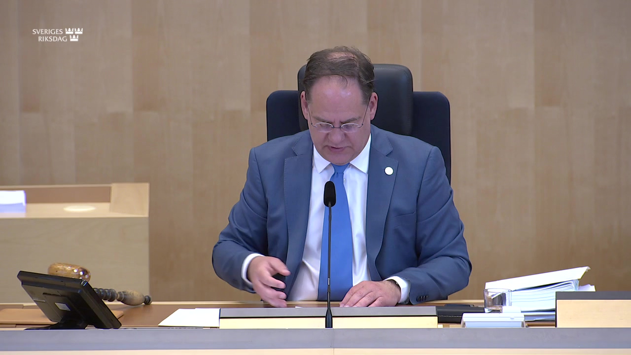 Stillbild från debatten i kammaren